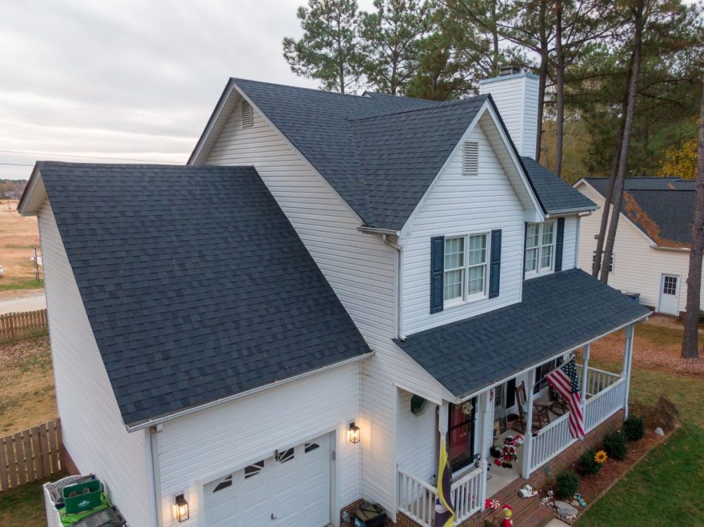 Aerial Drone Image of Newly Installed Asphalt Architectural Style Shingles On A Single Family Home